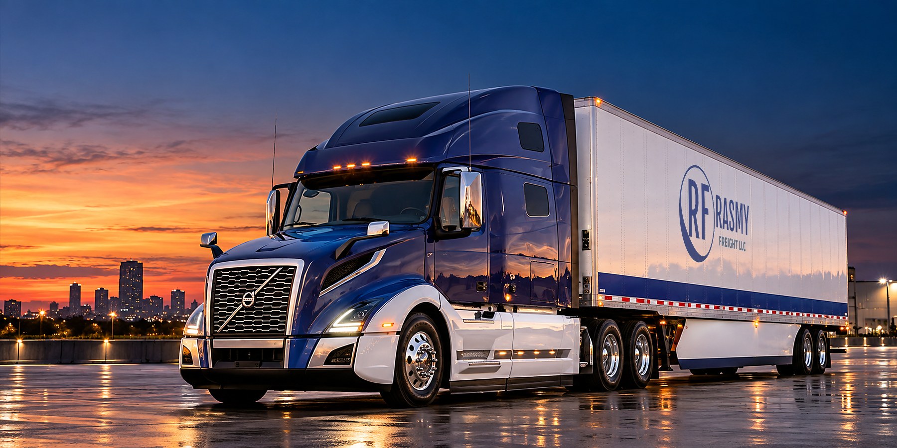 Newer Volvo VNL sleeper tractor with a Rasmy Freight dry van at dusk